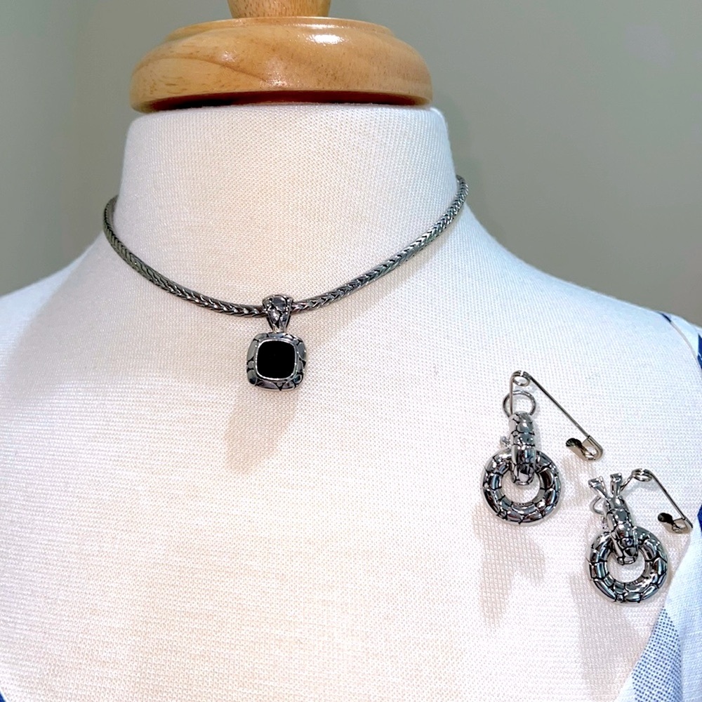 Necklace and earrings sold as a set. Silver with Onyx stone.